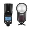 Godox V1 Speedlight for Canon-TTL II • Output: 76Ws • Auto Zoom Control, Zoom Range: 28-105mm • 2.4 GHz Wireless X-System Transmitter • Built-In LED Modelling Lamp • Tilts -7 to 120°, Rotates 330° • Round Flash Head Design • Magnetic Light Modifier Attachment • 1.5 sec Recycle Time, HSS Support • Removable, Rechargeable Li-Ion Battery Godox V1 Round Head Speedlight for CanonOverview Offering a powerful 76Ws output along with a distinct design, the Godox V1 Flash is an advanced light source with features that clearly reflect the current state of the industry. Compatible with Canon E-TTL / E-TTL II, this flexible on-camera light is distinguished by its round head, which provides soft, smooth light with gradual fall off that augments the flattering output. The head rotates 330 degrees, tilts -7 to 120°, and has a magnetic surface for lightning-fast attachment of Godox's accessory light modifiers. Check out the AK-R1 for more fun options The V1 is powered by a removable 2600mAh lithium-ion battery that will give you up to 480 full-power flashes on a charge, so you don't miss any of the action. Speaking of speed, the V1 recycles to full power in just 1.5 seconds, fast enough to keep up with your subject. It also supports High Speed Sync up to 1/8000 sec, for managing bright backgrounds and shooting with wide apertures, and the V1 supports front and rear-curtain sync. The V1 has an optical slave but it's also got a built-in 2.4 GHz receiver, which accepts wireless signals from Godox X System transmitters. In fact, you can control up to four wireless groups in a master/slave configuration whereby settings made on the V1 are duplicated on the slave flashes. Other convenience features include an AF assist lamp, a 3200K LED modelling lamp, and a 2.5mm port for cabled triggering. Godox V1 Speedlight for Canon What's In the Box: • Godox V1 Flash for Canon • Rechargeable Lithium-Ion Battery • Battery Charger • USB Charger and Cable • Mini Stand • Protection Bag • Limited 2-Year Godox SA Warranty Godox V1 Round Head Speedlight for Canon Specs Flash Head Coverage Full-Fram